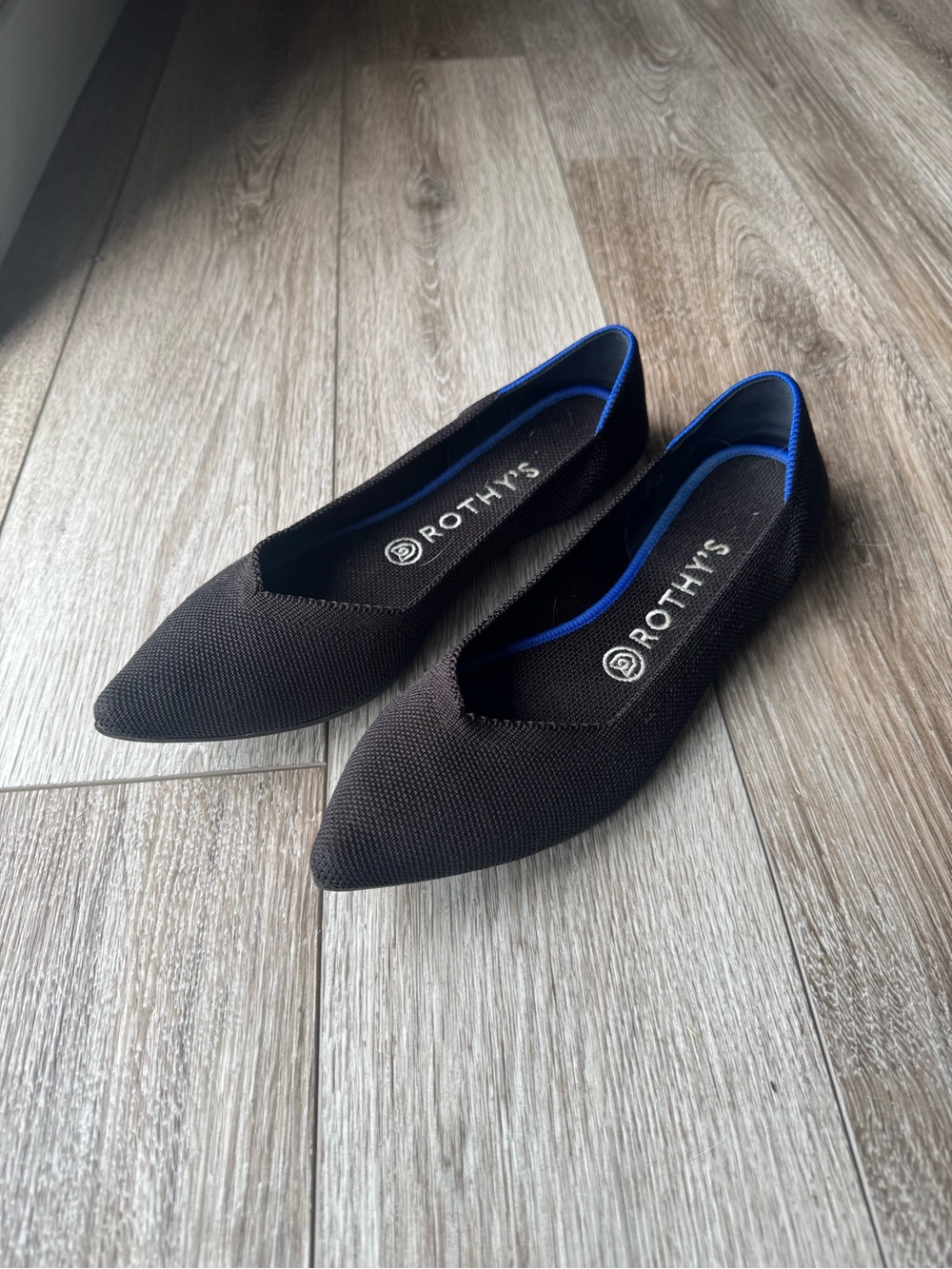 Rothy's Women's Pointed Flats in Black with Blue Trim